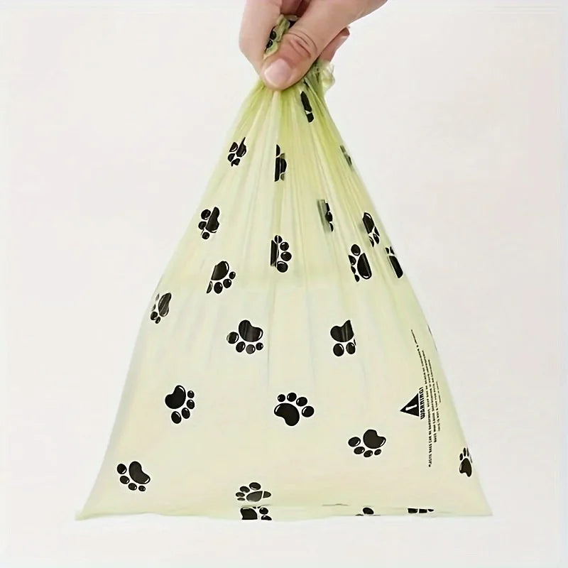 36 rolls of 540 pet feces bags, filled with leak proof dog bags, with paw print design, used for pet cleaning and outdoor use